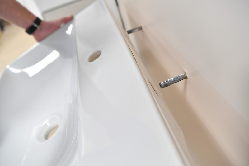 Step-by-step installation of hansgrohe’s Xelu Q vanity unit and basin paired with the Tecturis E two-hole basin mixer tap
