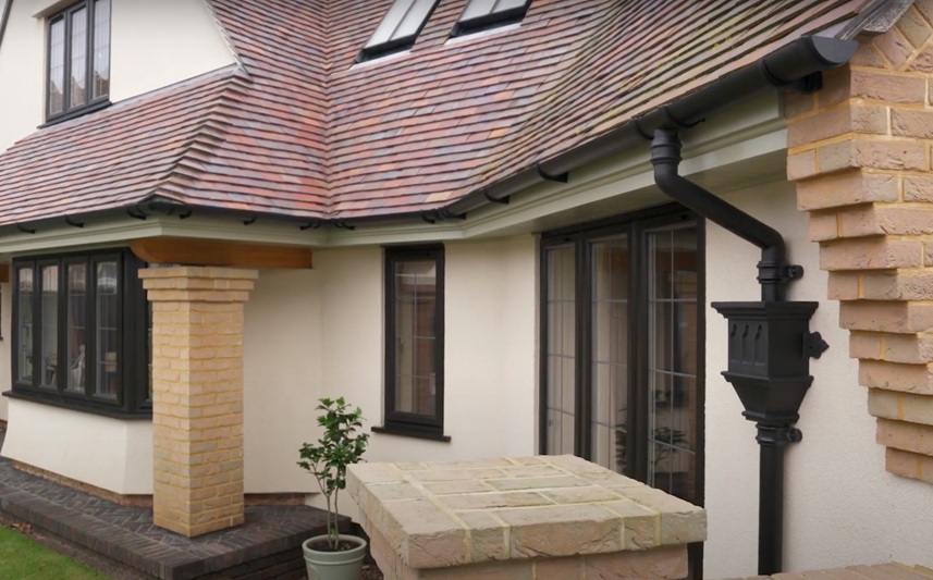 Image shows home with cast iron rainwater systems installed
