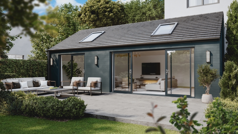 A modern garden room featuring large glass doors