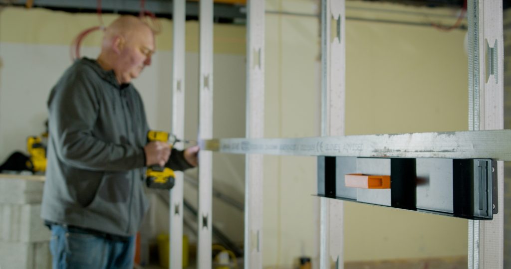 Image shows Metal Stud Genie being used