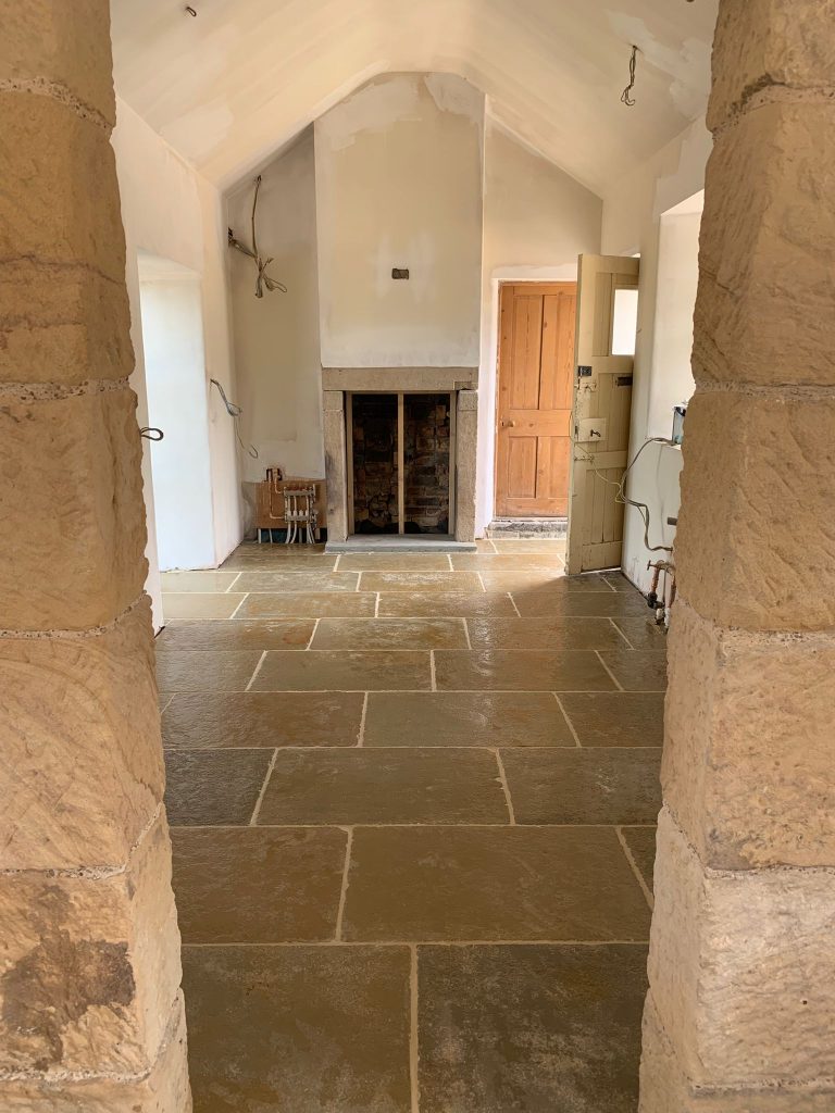 A natural stone tile floor in heritage style house