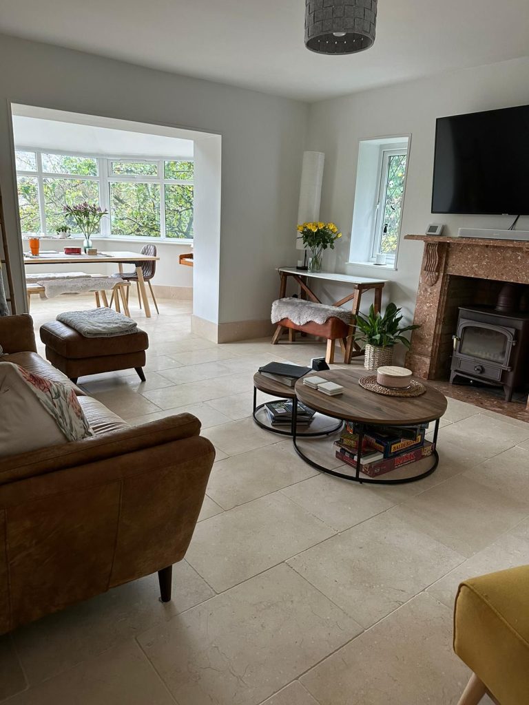 A natural stone tile floor in a living room