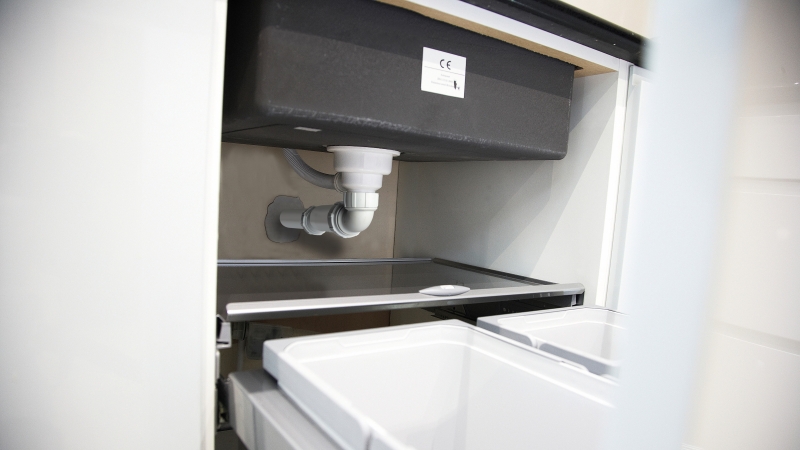 Image shows Wavin's waterless trap under the sink