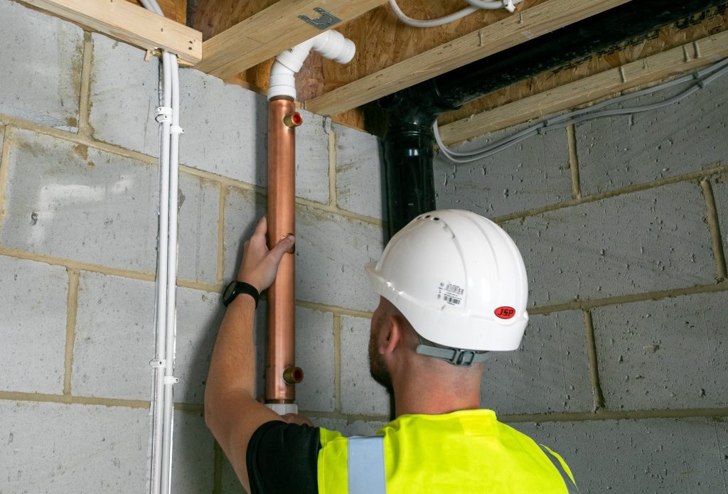 Installer undertakes Showersave installation